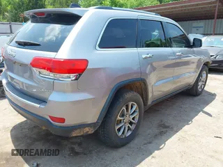 2014 Jeep Grand Cherokee Limited with VIN 1C4RJFBG4EC589321, listed as a IAAI auction lot 42335043 with 153,428 mi miles and . Bid and sale history available at DreamBid. Image 4.