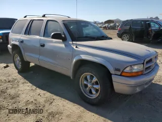 2000 Dodge Durango z VIN 1B4HR28Y4YF278422, wystawiony jako Copart lot #69119144 z przebiegiem 156 012 mil mil oraz Szkoda całkowita • Salvage title. Historia ofert i sprzedaży dostępna na DreamBid. Obrazek 4.