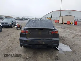 2010 Mitsubishi Lancer Evolution GSR with VIN JA32W8FV1AU012725, listed as a IAAI auction lot 41542629 with 124,347 mi miles and . Bid and sale history available at DreamBid. Image 16.
