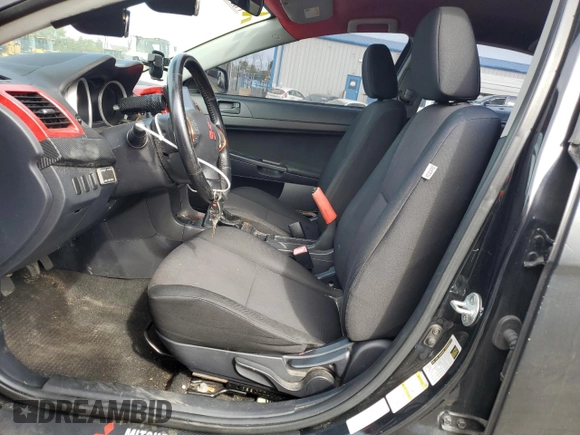 2009 Mitsubishi Lancer ES with VIN JA3AU26U49U002269, listed as a Copart auction lot 73992004 with 144,134 mi miles and Salvage Title. Bid and sale history available at DreamBid. Image 7.