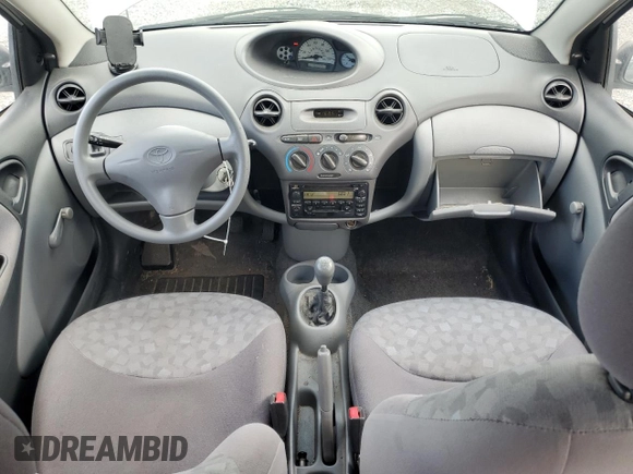 2000 Toyota ECHO with VIN JTDAT1239Y0040310, listed as a Copart auction lot 69115394 with 103,347 mi miles and Salvage Title. Bid and sale history available at DreamBid. Image 8.