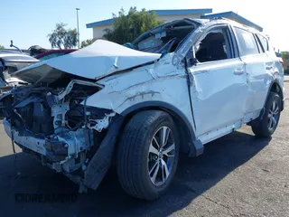 2018 Toyota RAV4 XLE with VIN 2T3WFREV3JW484955, listed as a IAAI auction lot 42262089 with 118,527 mi miles and . Bid and sale history available at DreamBid. Image 18.