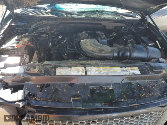 1999 Ford F-150 XL с VIN 2FTRX08L1XCA25770, выставлен на аукционе Copart как лот 82477264 с пробегом Не указан миль и Списание • Salvage title. История ставок и продаж доступна на DreamBid. Изображение 12.