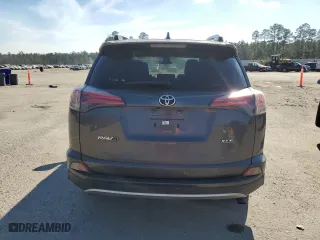 2018 Toyota RAV4 XLE with VIN JTMWFREVXJJ740121, listed as a Copart auction lot 46467085 with 100,648 mi miles and Salvage Title. Bid and sale history available at carsss.com. Image 6.