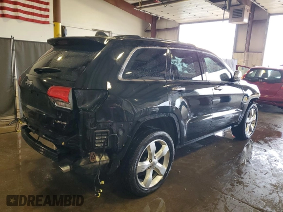 2015 Jeep Grand Cherokee Limited with VIN 1C4RJFBGXFC226717, listed as a Copart auction lot 53698355 with 104,200 mi miles and Salvage Title. Bid and sale history available at carsss.com. Image 3.