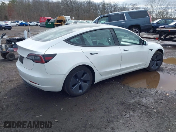 2023 Tesla Model 3 z VIN 5YJ3E1EA8PF671613, wystawiony jako IAAI lot #41737438 z przebiegiem 21 405 mil mil oraz . Historia ofert i sprzedaży dostępna na DreamBid. Obrazek 4.