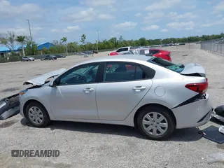 2023 Kia Rio S z VIN 3KPA24AD4PE604207, wystawiony jako IAAI lot #42077201 z przebiegiem 16 559 mil mil oraz . Historia ofert i sprzedaży dostępna na DreamBid. Obrazek 14.