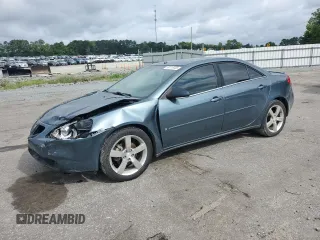 2006 Pontiac G6 GTP with VIN 1G2ZM551264217310, listed as a Copart auction lot 60116035 with 66,452 mi miles and Salvage title. Bid and sale history available at DreamBid. Image 1.