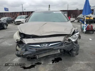 2012 Hyundai Accent GLS z VIN KMHCT4AE9CU187186, wystawiony jako Copart lot #50364835 z przebiegiem 85 638 mil mil oraz Szkody całkowita. Historia ofert i sprzedaży dostępna na DreamBid. Obrazek 5.