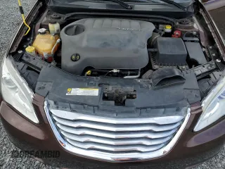 2013 Chrysler 200 Touring z VIN 1C3BCBEGXDN609899, wystawiony jako Copart lot #74966724 z przebiegiem 38 028 mil mil oraz Szkoda całkowita • Salvage title. Historia ofert i sprzedaży dostępna na DreamBid. Obrazek 11.