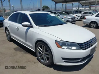 2014 Volkswagen Passat SE z VIN 1VWBT7A37EC037874, wystawiony jako IAAI lot #42661923 z przebiegiem 201 716 mil mil oraz . Historia ofert i sprzedaży dostępna na DreamBid. Obrazek 1.