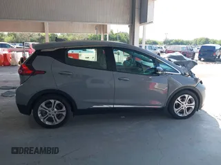2020 Chevrolet Bolt EV LT z VIN 1G1FY6S01L4109222, wystawiony jako IAAI lot #42231173 z przebiegiem 43 570 mil mil oraz . Historia ofert i sprzedaży dostępna na DreamBid. Obrazek 13.