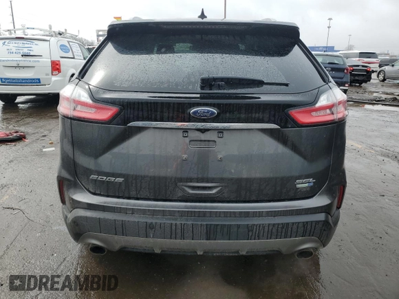 2020 Ford Edge SEL z VIN 2FMPK4J93LBB36067, wystawiony jako Copart lot #49913935 z przebiegiem 83 557 mil mil oraz Czysty tytuł • Clean title. Historia ofert i sprzedaży dostępna na DreamBid. Obrazek 6.