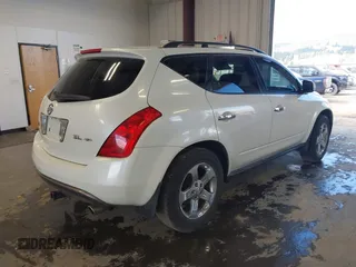 2003 Nissan Murano SL with VIN JN8AZ08W13W214133, listed as a IAAI auction lot 42057504 with 163,751 mi miles and . Bid and sale history available at DreamBid. Image 4.