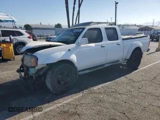 2002 Nissan Frontier XE with VIN 1N6ED29X92C361991, listed as a Copart auction lot 63420395 with 257,774 mi miles and Salvage title. Bid and sale history available at DreamBid. Image 1.