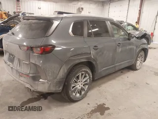 2024 Mazda CX-50 S Select with VIN 7MMVABAM0RN221288, listed as a IAAI auction lot 40983418 with 9,744 mi miles and . Bid and sale history available at DreamBid. Image 4.