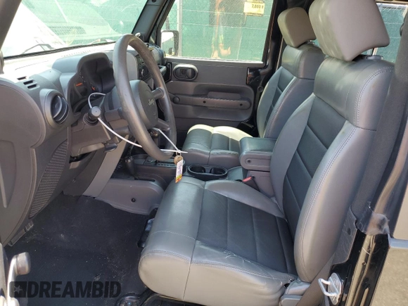 2009 Jeep Wrangler X z VIN 1J4FA24179L716499, wystawiony jako Copart lot #58342675 z przebiegiem 116 871 mil mil oraz Szkoda całkowita • Salvage title. Historia ofert i sprzedaży dostępna na DreamBid. Obrazek 7.