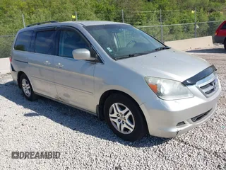 2007 Honda Odyssey EX-L z VIN 5FNRL38627B441908, wystawiony jako IAAI lot #42253733 z przebiegiem 204 603 mil mil oraz . Historia ofert i sprzedaży dostępna na DreamBid. Obrazek 1.