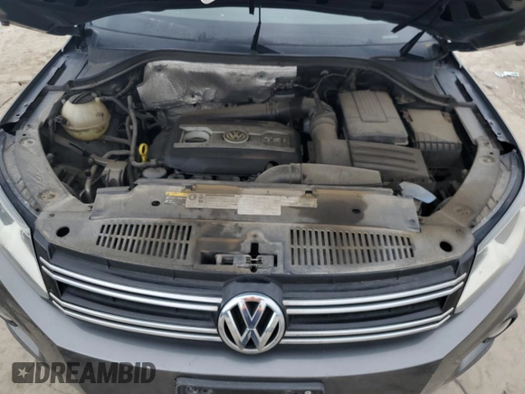 2015 Volkswagen Tiguan R-Line z VIN WVGAV7AX7FW515931, wystawiony jako Copart lot #52606635 z przebiegiem 127 391 mil mil oraz Czysty tytuł • Clean title. Historia ofert i sprzedaży dostępna na DreamBid. Obrazek 12.