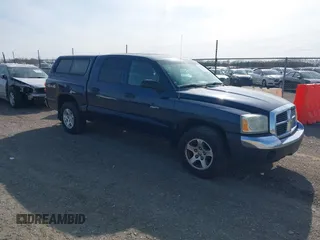 2005 Dodge Dakota SLT with VIN 1D7HW48N75S110229, listed as a IAAI auction lot 41909362 with 193,812 mi miles. Bid and sale history available at carsss.com. Image 1.
