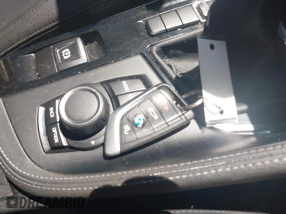 2017 BMW X1 sDrive28i with VIN WBXHU7C31H5H33281, listed as a IAAI auction lot 41814792 with 55,756 mi miles. Bid and sale history available at carsss.com. Image 11.