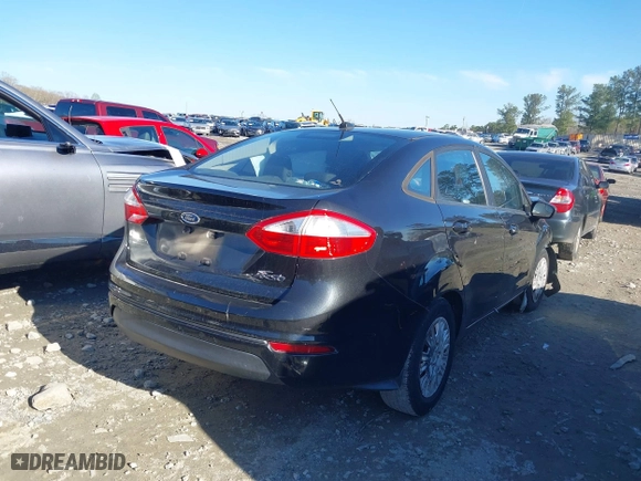 2015 Ford Fiesta S with VIN 3FADP4AJ6FM207628, listed as a IAAI auction lot 41847859 with 221,538 mi miles. Bid and sale history available at carsss.com. Image 4.