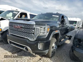 2020 GMC Sierra 3500HD Denali z VIN 1GT49WEY6LF219913, wystawiony jako Copart lot #81090434 z przebiegiem 87 356 mil mil oraz Tytuł czysty. Historia ofert i sprzedaży dostępna na DreamBid. Obrazek 1.