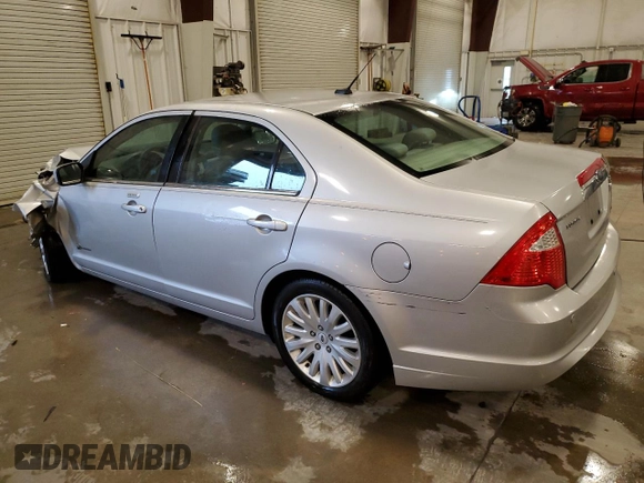 2010 Ford Fusion Hybrid with VIN 3FADP0L32AR142750, listed as a Copart auction lot 62395305 with 144,384 mi miles and Salvage title. Bid and sale history available at DreamBid. Image 2.
