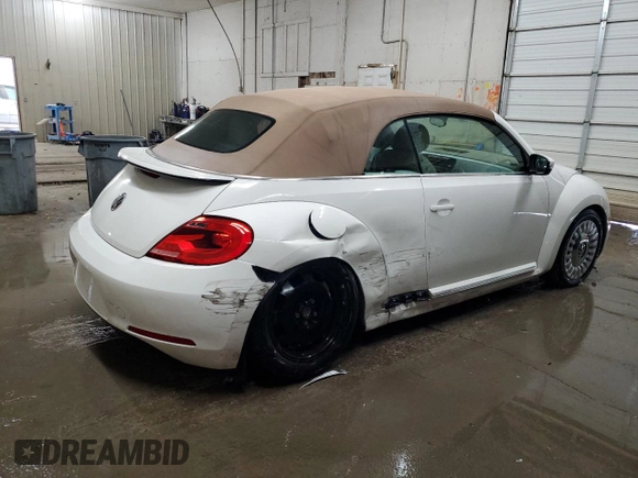 2013 Volkswagen Beetle 2.5L w/Sound/Nav z VIN 3VW5P7AT7DM811619, wystawiony jako Copart lot #60331015 z przebiegiem 115 532 mil mil oraz Szkoda całkowita • Salvage title. Historia ofert i sprzedaży dostępna na DreamBid. Obrazek 3.