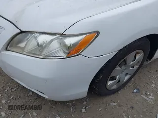 2007 Toyota Camry CE z VIN 4T1BE46K97U640376, wystawiony jako IAAI lot #42374162 z przebiegiem 251 260 mil mil oraz . Historia ofert i sprzedaży dostępna na DreamBid. Obrazek 6.