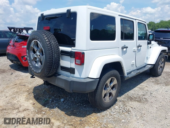 2018 Jeep Wrangler Unlimited Sahara with VIN 1C4BJWEG3JL805263, listed as a IAAI auction lot 42593276 with 96,489 mi miles and . Bid and sale history available at DreamBid. Image 4.