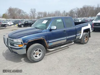 1999 Chevrolet Silverado 1500 LT with VIN 1GCEK19T3XE123498, listed as a IAAI auction lot 41801019 with 213,646 mi miles. Bid and sale history available at carsss.com. Image 2.
