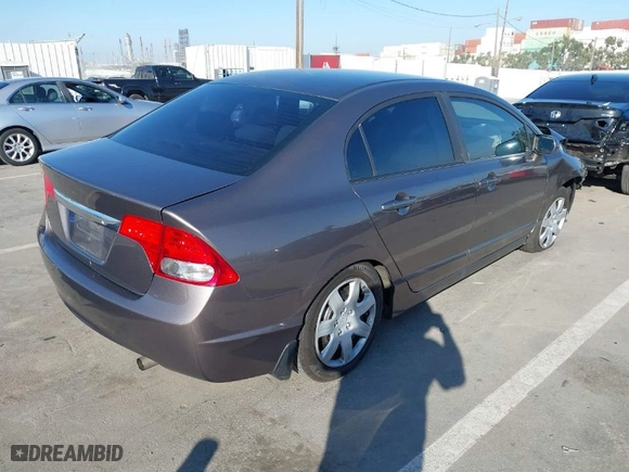 2011 Honda Civic Sdn LX with VIN 19XFA1F54BE048532, listed as a IAAI auction lot 41636667 with 117,065 mi miles. Bid and sale history available at carsss.com. Image 4.
