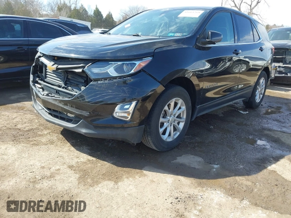 2019 Chevrolet Equinox LT z VIN 3GNAXUEV0KL216360, wystawiony jako IAAI lot #41664268 z przebiegiem 69 411 mil mil oraz . Historia ofert i sprzedaży dostępna na DreamBid. Obrazek 18.