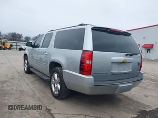 2013 Chevrolet Suburban LTZ with VIN 1GNSCKE02DR369777, listed as a IAAI auction lot 41565371 with 205,768 mi miles and . Bid and sale history available at DreamBid. Image 3.