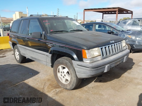 1995 Jeep Grand Cherokee Laredo z VIN 1J4GZ58S9SC553345, wystawiony jako IAAI lot #42772979 z przebiegiem 216 808 mil mil oraz . Historia ofert i sprzedaży dostępna na DreamBid. Obrazek 1.