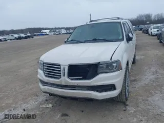 2015 Lincoln Navigator L with VIN 5LMJJ3JT2FEJ03906, listed as a IAAI auction lot 41246837 with 170,298 mi miles. Bid and sale history available at carsss.com. Image 6.