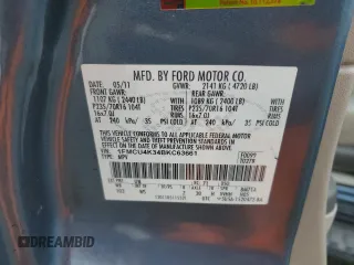 2011 Ford Escape Hybrid z VIN 1FMCU4K34BKC63661, wystawiony jako Copart lot #50991195 z przebiegiem 109 791 mil mil oraz Szkoda całkowita • Salvage title. Historia ofert i sprzedaży dostępna na DreamBid. Obrazek 13.