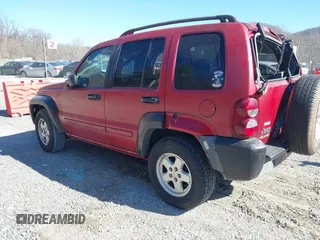 2005 Jeep Liberty Sport with VIN 1J4GL48K35W645419, listed as a IAAI auction lot 41823845 with 168,896 mi miles. Bid and sale history available at carsss.com. Image 3.