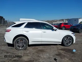 2022 Genesis GV70 2.5T with VIN KMUMADTB5NU051297, listed as a IAAI auction lot 41892642 with 46,421 mi miles and . Bid and sale history available at DreamBid. Image 13.