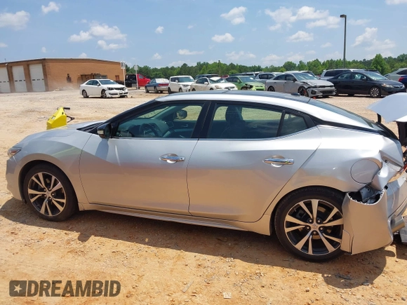 2016 Nissan Maxima SR with VIN 1N4AA6AP7GC389606, listed as a IAAI auction lot 42451614 with 114,957 mi miles and . Bid and sale history available at DreamBid. Image 14.