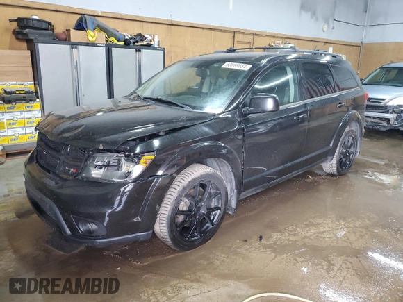 2013 Dodge Journey Crew with VIN 3C4PDCCG4DT693869, listed as a Copart auction lot 63666684 with 134,424 mi miles and Salvage title. Bid and sale history available at DreamBid. Image 1.