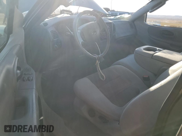 2003 Ford F-150 XL with VIN 1FTRF072X3KC94240, listed as a Copart auction lot 86130954 with 101,042 mi miles and Salvage title. Bid and sale history available at DreamBid. Image 8.