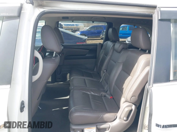2014 Honda Odyssey EX-L with VIN 5FNRL5H63EB136541, listed as a IAAI auction lot 41866320 with 148,696 mi miles and . Bid and sale history available at DreamBid. Image 8.