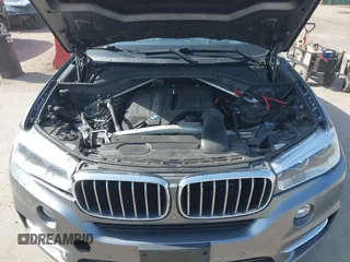 2015 BMW X5 xDrive35i with VIN 5UXKR0C53F0K60910, listed as a IAAI auction lot 41857733 with 153,583 mi miles. Bid and sale history available at carsss.com. Image 10.