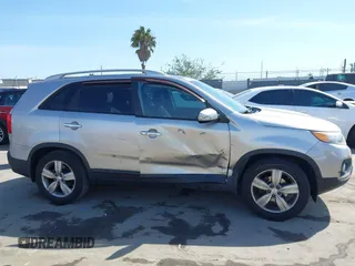 2013 Kia Sorento EX with VIN 5XYKU4A20DG412133, listed as a IAAI auction lot 41826871 with 76,233 mi miles and . Bid and sale history available at carsss.com. Image 6.