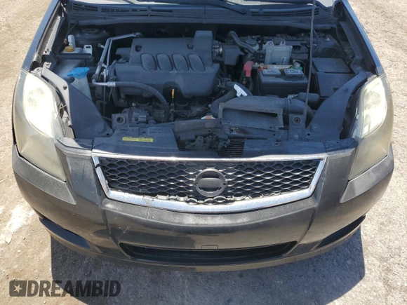 2011 Nissan Sentra S z VIN 3N1AB6AP6BL697454, wystawiony jako Copart lot #63812275 z przebiegiem 168 584 mil mil oraz Szkoda całkowita • Salvage title. Historia ofert i sprzedaży dostępna na DreamBid. Obrazek 11.