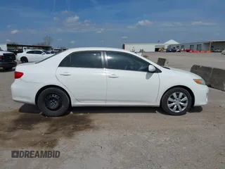 2013 Toyota Corolla L with VIN 5YFBU4EE1DP090957, listed as a IAAI auction lot 41898057 with 127,438 mi miles and . Bid and sale history available at DreamBid. Image 13.