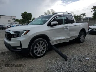 2023 Honda Ridgeline RTL-E with VIN 5FPYK3F76PB064582, listed as a Copart auction lot 63629375 with 11,940 mi miles and Salvage title. Bid and sale history available at DreamBid. Image 1.