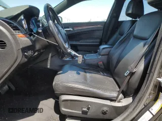 2014 Chrysler 300 with VIN 2C3CCAAG8EH307087, listed as a Copart auction lot 54091345 with 217,869 mi miles and Salvage Title. Bid and sale history available at DreamBid. Image 7.